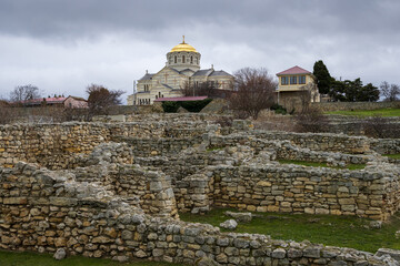 Ruins of the ancient city of Chersonese. View of a large church and ruined old stone buildings....