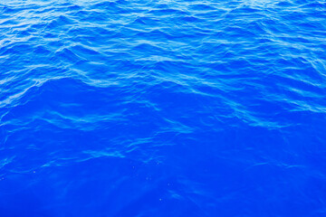 Very nice sea water background or backdrop with selective focus. Small waves of natural water...