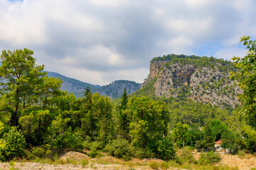 Fototapeta premium Turkish Taurus Mountains in the Kemer region of Antalya province. Background with copy space