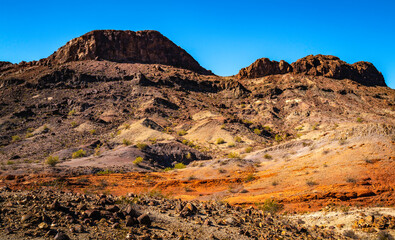 Sara Mountain Park trails arid desert landscape with red rock sandstone formation in Lake Havasu City, Arizona