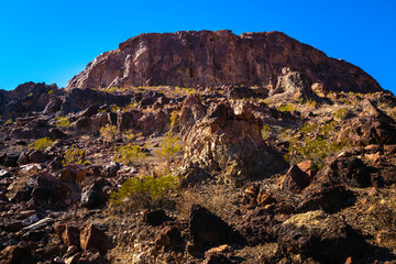 Sara Mountain Park trails arid desert landscape with red rock sandstone formation in Lake Havasu City, Arizona