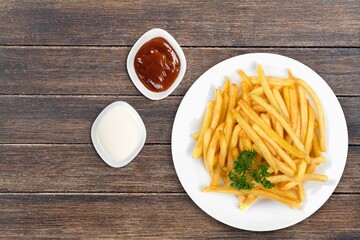 Tasty fast food fry potato with sause