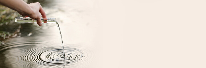 banner Pond water pollution concept. Scientist biologist and researcher takes samples of dirty...