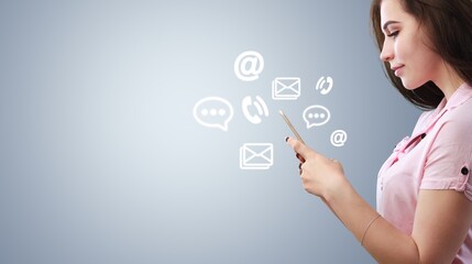 Person holding a phone and icons for chat.