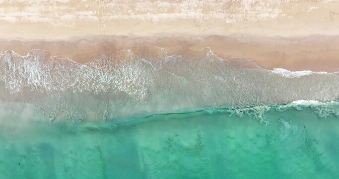 Nature video Drone view of clear turquoise sea and waves in summer Tropical beach Phuket Thailand.