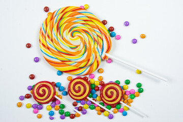 Fototapeta na wymiar Colorful lollipops upon a white background