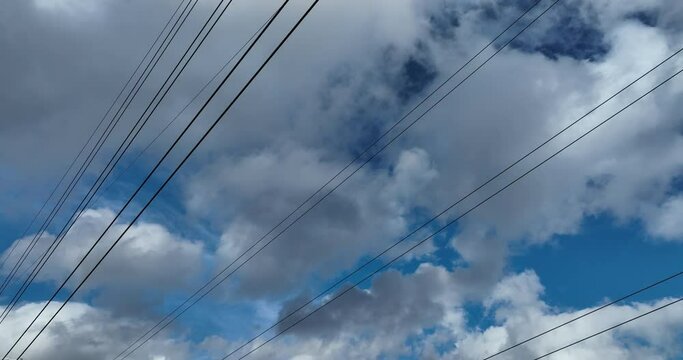 Aerial footage of  Electricity network on cloudy background