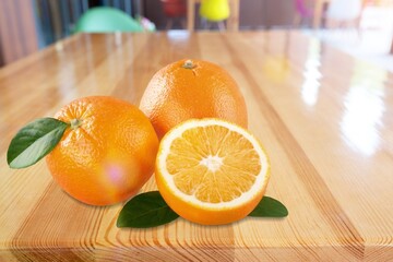 Fresh juicy citrus fruits on wooden desk