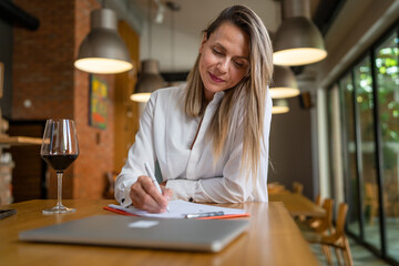 woman female enologist wine quality check at winery