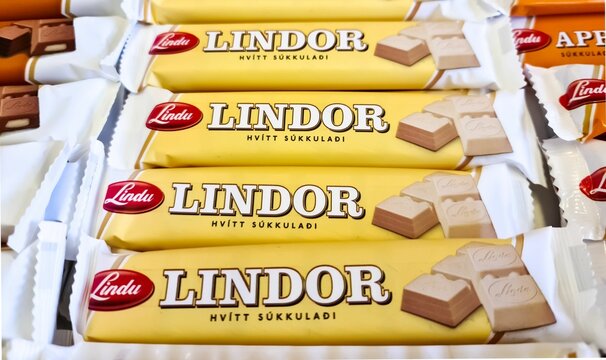 The Lindor brand chocolate bar packages on a supermarket shelf