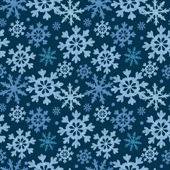 Fototapeta na wymiar Christmas seamless pattern. Blue winter holiday background with hand drawn textured snowflakes.