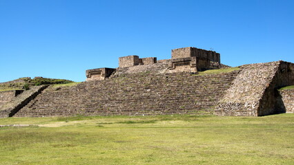 Fototapeta na wymiar Stepped pyramid at Monte Alban, in Oaxaca, Mexico