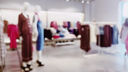Fashion, retail and shop, blurred interior view of apparel clothing store in luxury shopping mall as defocused background. High quality 4k footage