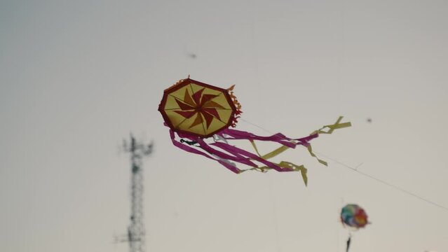 Colorful Kites Flying In Sumpango, Guatemala For The Day Of The Dead Celebration - low angle shot