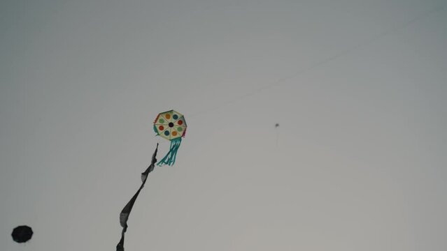 Giant Kites Flying In Sumpango, Guatemala To Honor The Dead During Dia de los Muertos - low angle