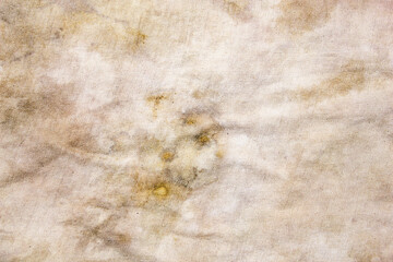 Dirty spots on fabric. The texture of the soiled matter. The soiled unhygienic surface of the...