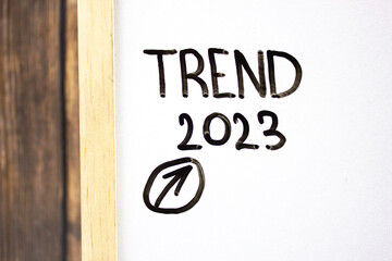 TREND 2023 - concept text on a white board written in black marker.