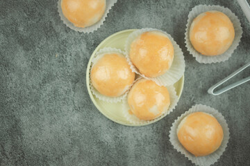 Mooncake filled sweet mung bean paste and salted egg yolk. Homemade bakery concept
