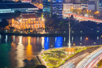 Enjoy the Nha Rong wharf and Bach Dang harbor in Ho Chi Minh City (Saigon). Colorful Saigon river at night. Travel concept.