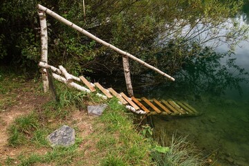 Water entry for hardiers in an old flooded quarry. Opatovice. Central Moravia. Czechia. 