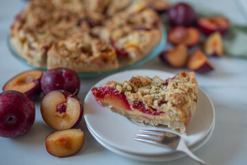 sweet German plum cake (Zwetschgenkuchen) with crumbles