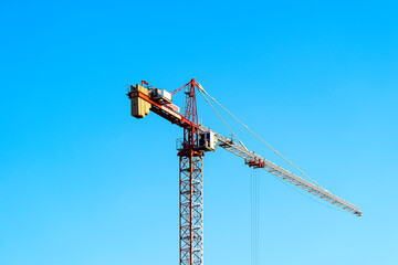 ,tower crane against the sky and Ostankino TV tower