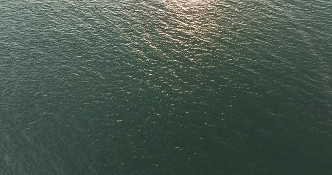 Aerial drone footage of ocean landscape in the morning