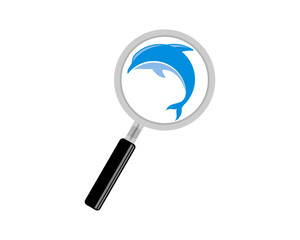 magnifying glass with dolphin inside