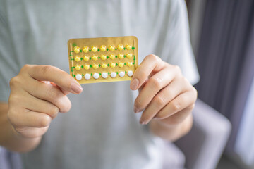 Woman and choosing to use birth control pills Contraceptive methods and birth control pills in women