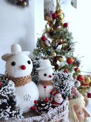 Snowman and pie tree are decorated for Christmas celebration