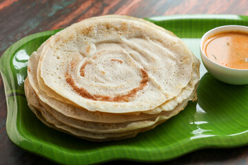 Dosa , Dosai, ghee roast, tomato coconut chutney sambar popular South Indian Breakfast, Kerala, Tamil Nadu India. Top view of Masala dosa Kerala breakfast food. Indian food