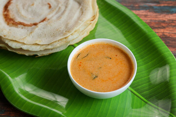 Dosa , Dosai, ghee roast, tomato coconut chutney sambar popular South Indian Breakfast, Kerala, Tamil Nadu India. Top view of Masala dosa Kerala breakfast food. Indian food