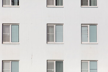 Windows in a white multi-storey building