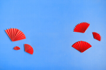 Chinese new year festival decoration with red paper fans. Mockup copyspace.