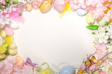 Easter holiday background with flowers and eggs