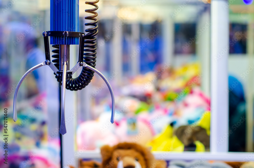 Wall mural a claw crane game machine with toys