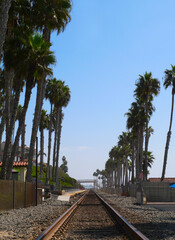 Train tracks near the San Clemente Pier in Orange County, California, USA - obrazy, fototapety, plakaty