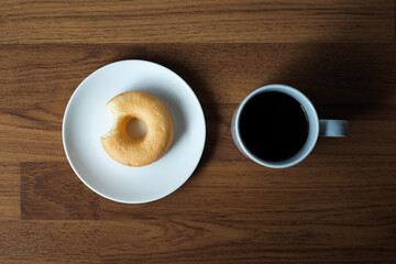 breakfast with donut homemade and coffee cup