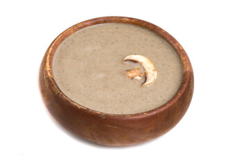 bowl of champignons soup on a white background