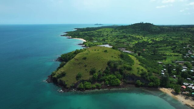 Aerial view around seaside hill at the Morro Peixe town in sunny Sao Tome, Africa