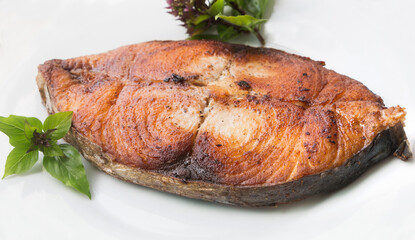 King mackerel steak on white background, fried fish