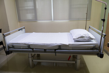 Empty adjustable patient bed