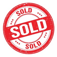 SOLD text written on red round stamp sign
