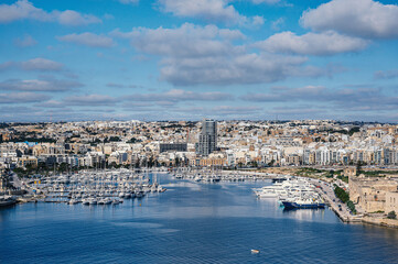 Sliema harbor with modern buildings and sail boats in Malta - obrazy, fototapety, plakaty