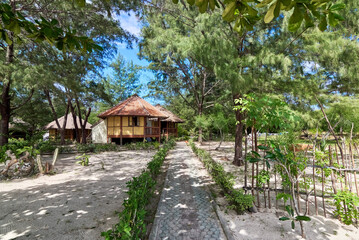 Fototapeta na wymiar Tropical bungalow - traditional house which use natural material