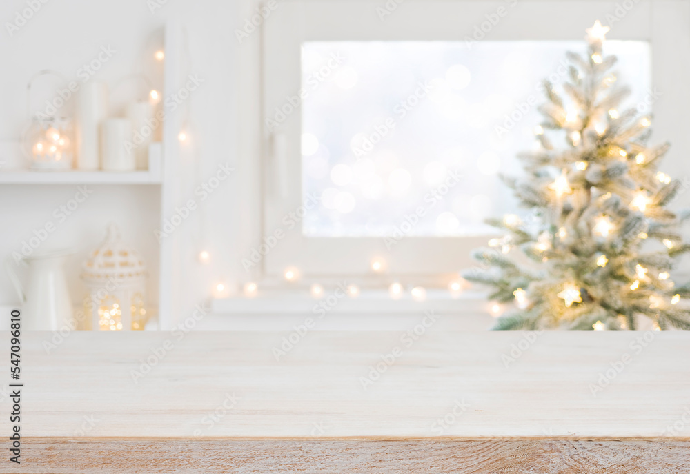 Sticker empty table in front of christmas tree with decoration background