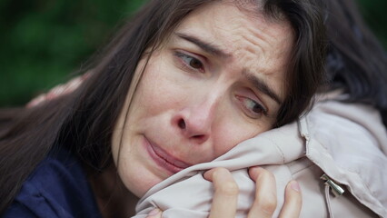 Sad woman suffering from depression crying on friend shoulder. Suffering person negative emotion....