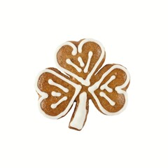 Decorated Christmas gingerbread shamrock. Homemade gingerbread in a shape of the three-leaf clover on white background. Flat lay.