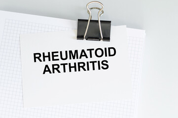 a card with the name of the diagnosis - rheumatism arthritis. Medical concept.
