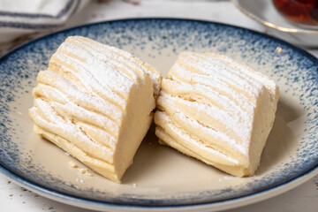 Flour cookies on a white wooden background. Mediterranean cuisine delicacies. Bakery desserts. close up